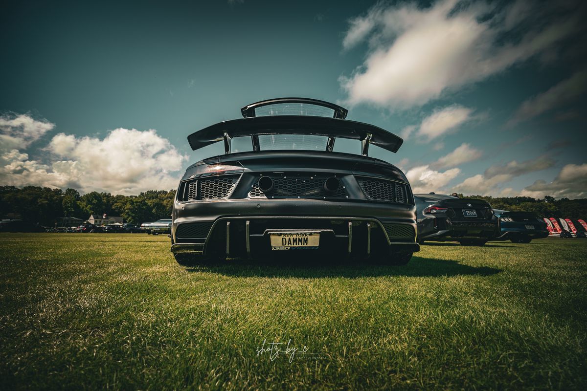 Winged Audi R8 on a grass field